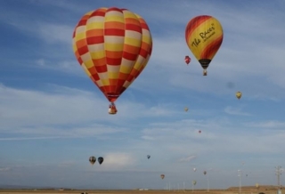 several balloons in the air 